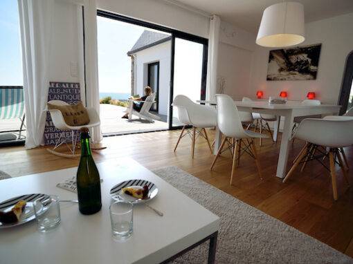 Salon vue terrasse maison de la plage